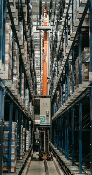 Tall warehouse with cases of beer and wine