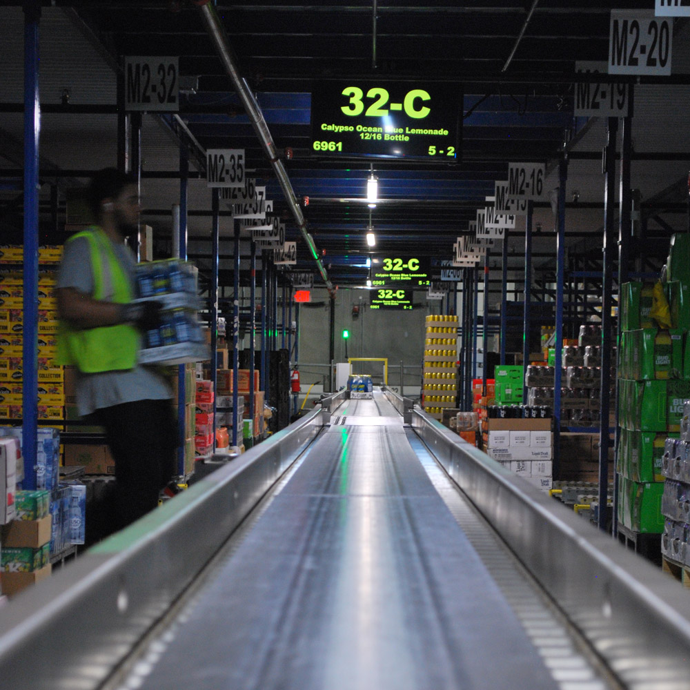 DSC_1095 Loading cases of beer onto conveyer belt